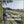 Load image into Gallery viewer, Female Gravel riding on a gravel trail alongside a freshy harvested golden cornfield.