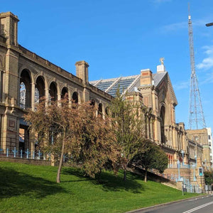 South façade of Alexandria Palace in Muswell hill complete with the antennae, starting point of Hidden Tracks Cycling's Palace to Palace ride across London.