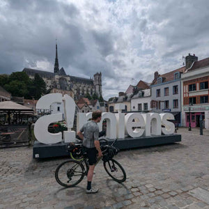 Unavoidably Amiens, l, picture of a large town sign in front of the Cathedral in Amiens