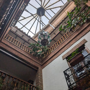 The magnificent hall of the mini Palacio in Guadix, showcasing its stunning architecture, part of the cultural experience on Hidden Tracks Cycling's Flamenco Gravel trip
