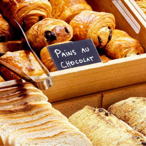 French gravel ride from London to Paris featuring a classic French breakfast with Pain aux Chocolat