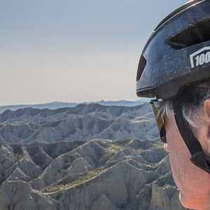 @charliecycleguide looking over the russet canyons of Spain's Badlands on Hidden tracks Cycling's Flamenco Gravel bike holiday.