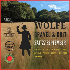 Promotional poster for Wolfe Gravel & Grit event with silhouette of a person on a gravel road.