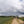 Load image into Gallery viewer, Group of 4 cyclists riding on a farm track