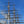 Load image into Gallery viewer, Masts of the Cutty Sark as seen from Tidal Explorer, a traffic-free  gpx bike route from Hidden Tracks Cycling