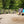Load image into Gallery viewer, Collection of muddy mountain bikes at the High Beech Kiosk in Epping Forest on one of Hidden Tracks Cycling’s off-road bike routes from London.
