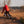 Load image into Gallery viewer, skilled gravel rider cornering at speed and kicking up a dust storm