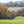 Load image into Gallery viewer, Happy Valley in the early spring with trees just in leaf from Hidden tracks cycling 4 Commons GPX bike route