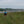 Load image into Gallery viewer, Cyclist approaching the Medway Bridge on Hidden Tracks Cycling’s off-road bike Pilgrimage routes from London to Rochester.