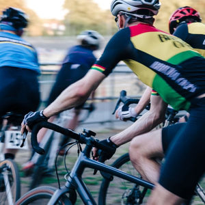 Group of agult cyclocross riders cvornering in the MAAP Summercross race at Herne Hill velodrome