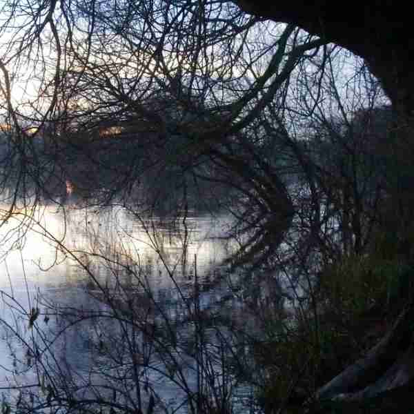 Early sun rise over the Thames, seen on the Womble Hunt bike ride one of Hidden Tracks Cycling collection of Bike routes around London