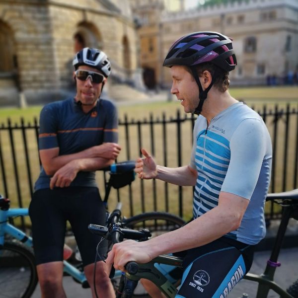 pair of cyclists discussing something very important