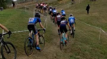 Cyclocross riders climbing a hill at Canada Heights.