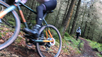 Mountain bike rider on a wooden trail 