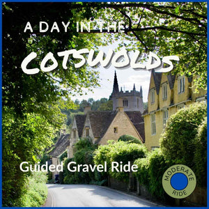 A picturesque Cotswold village with a church spire, inviting you to join a guided gravel bike ride from London.