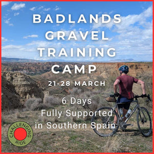 Advertisement for Badlands Gravel Training Camp with a cyclist in Southern Spain.