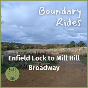 Easy gravel bike ride in London from Enfield Lock to Mill Hill Broadway, featuring a wide dirt trail, open countryside, and peaceful off-road cycling scenery.