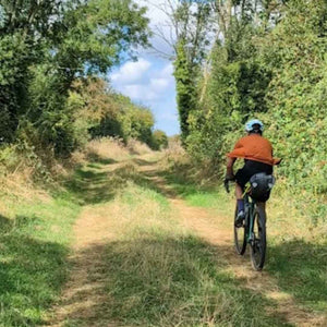 The historic Salt Road winds through the countryside, providing a challenging yet rewarding gravel bike ride.