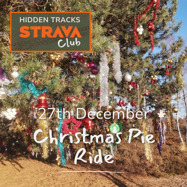 Decorated Christmas tree with ornaments and lights, featuring 'Hidden Tracks Strava Club' and details of the Christmas Pie Gravel ride 
