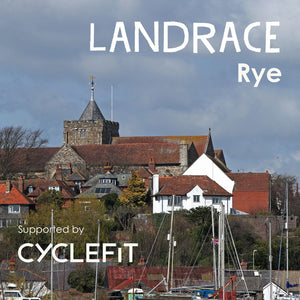 Title image of Hidden Tracks Cycling Gravel ride to from London to Rye showing the church tower above some sailing boats 