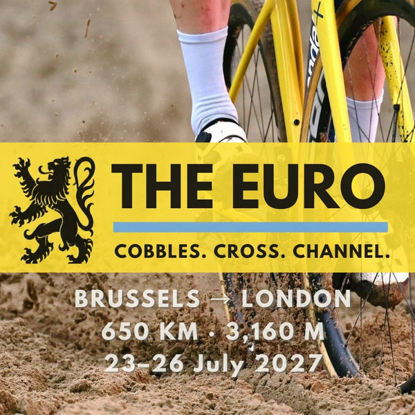 Muddy cyclocross shoe and yellow gravel bike pushing through deep sand, product image for THE EURO's Brussels to London gravel ultra, 23–26 July 2027.