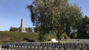 War cemetery on the Western Front near Waterloo, marking the historic landscapes crossed on the Landrace London to Brussels gravel cycling adventure.