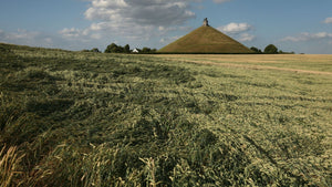 The Lion’s Mound at Waterloo rising above open farmland, final destination of the Landrace gravel cycling journey from London to Brussels.