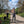 Load image into Gallery viewer, Cyclists pause with their bikes in front of Osterley House on this West London gravel bike route
