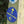 Load image into Gallery viewer, Blue Camino Inglés to Santiago waymark with yellow arrow and scallop shell, seen alongside a cycle trail sign on the Drover's Road to Winchester route.
