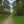 Load image into Gallery viewer, Wide gravel forestry track through mixed woodland on the Drover's Road to Winchester GPX route.
