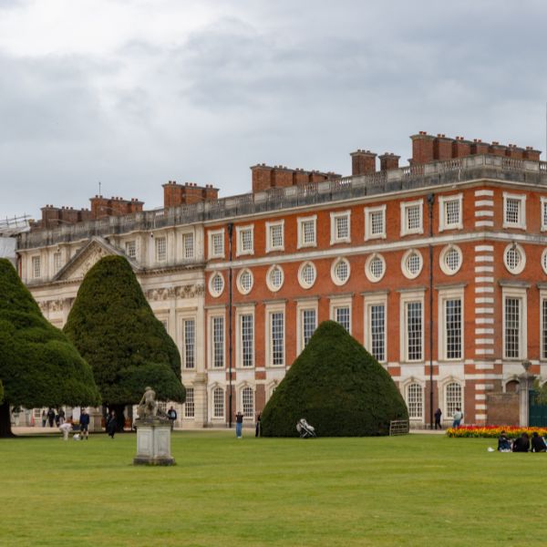 Hampton Court Palace's red-brick facade and topiary gardens, the starting point for this bike ride in London
