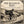 Load image into Gallery viewer, The Runaway King gravel GPX route title card, London to Faversham: an engraving-style illustration of a crowned king in a flowing cloak riding a gravel bike along a chalk track on the North Downs.
