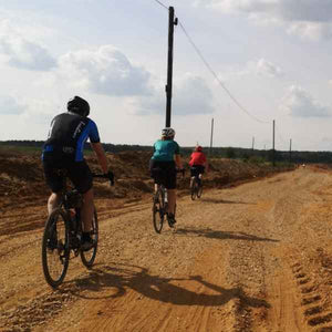 Gravel riders riding along a sandy gravelly Trail near St Albans  
