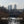Load image into Gallery viewer, Skyline of canary Wharf over looking a creek in the River Thames 
