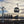 Load image into Gallery viewer, The Thames cable car at sunset near the Royal Docks
